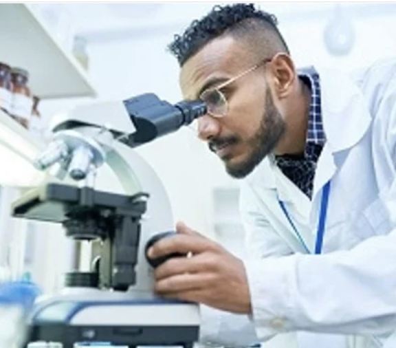 Scientist reviewing a sample in a laboratory